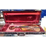 A 'CONSERVATORY' VIOLIN, with paper,'Stradivarius' label, in a crocodile effect case