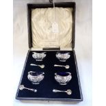 A SILVER FOUR-PIECE CRUET SET, in fitted case (2.8oz)