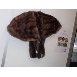 A VINTAGE FUR STOLE and a similar item of fur (2)