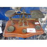 A SET OF VICTORIAN BRASS POSTAL SCALES