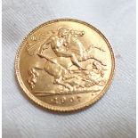 A HALF GOLD SOVEREIGN DATED 1907
