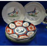 A PAIR OF FRENCH FAIENCE PLATES, decorated with birds, two Pountney & Co plates , with iris