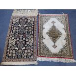 A NAIN SILK PRAYER RUG,the central design depicting rabbits & birds around trees & water feature,