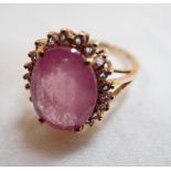A PINK SAPPHIRE AND MORGANITE RING, on a gold shank stamped '375', ring size O
