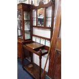 AN EDWARDIAN OAK HALL STAND with tiled back, 77cm wide