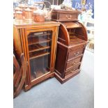 A REPRODUCTION HARDWOOD ROLL TOP DESK of small proportions, 53cm wide and a Victorian aesthetic