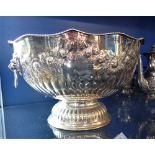 A SILVER PLATED PUNCH BOWL and a goblet
