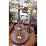 A 19TH CENTURY TREEN COTTON REEL STAND and a pair of similar candlesticks