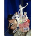 THREE DOULTON FIGURES and a Winston Churchill Toby jug