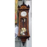 A 19TH CENTURY VIENNA REGULATOR WALL CLOCK in a figured walnut and ebonised case