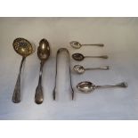 A COLLECTION OF SILVER CUTLERY, including a silver sugar sifter and others similar (c.6oz)