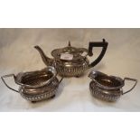 A THREE-PIECE SILVER TEA SET, part fluted decoration (c.21.6oz)