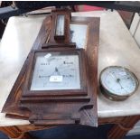 A 1930S OAK CASED BAROMETER, a brass cased barometer (examine) and a pair of Vintage framed prints