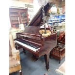A BABY GRAND PIANO BY HOHNER, model HF-152, serial number G086344 in a lacquered mahogany case,
