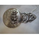 A DANISH SILVER PURSE MIRROR, the reverse embossed with a tavern scene, with pierced foliate