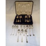 A SET OF SILVER TEA SPOONS AND SUGAR NIPS IN A FITTED PRESENTATION CASE, with other similar silver