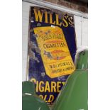 AN EARLY 20TH CENTURY ENAMEL SIGN, 'WILLS'S CIGARETTES SOLD HERE' depicting a packet of