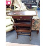 A 19TH CENTURY FRENCH MAHOGANY WORK TABLE with two tiers and a drawer with ormolu mounts and