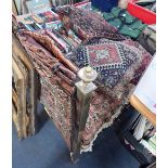 A COLLECTION OF CUSHIONS made from antique Persian rugs and a bagface