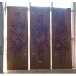 THREE PINE PANELS DECORATED WITH 'MUSICAL TROPHIES' IN PLASTER, each 91cm high x 30cm wide