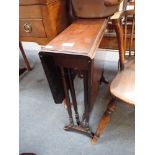 AN EDWARDIAN MAHOGANY SUTHERLAND TABLE