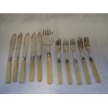 A COLLECTION OF SILVER BONE HANDLE FISH KNIVES AND FORKS.