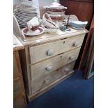 A VICTORIAN STRIPPED PINE CHEST OF DRAWERS of small proportions with raised back stand, 72cm wide