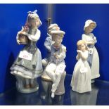 FOUR LLADRO FIGURES and a Nao figure (5)