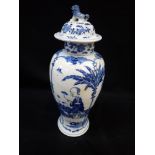 A CHINESE BLUE AND WHITE BALUSTER VASE and cover, with four character mark to the base, 37cm high (