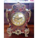 A LATE 19TH CENTURY BOULLE MANTLE CLOCK with ormolu mounts, 24cm high