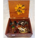 A COLLECTION OF COSTUME JEWELLERY, in a hinged wooden case
