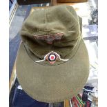 A NAZI STYLE AFRICA CORPS CAP with red lining