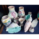 A COLLECTION OF POOLE POTTERY TRADITIONAL WARES, two conch shells and a pig money box