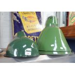 A PAIR OF LARGE GREEN ENAMEL SHADES and another smaller