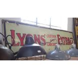 AN EARLY 20TH CENTURY ENAMEL SIGN, 'LYONS' COFFEE AND CHICORY EXTRACT' 154cm wide