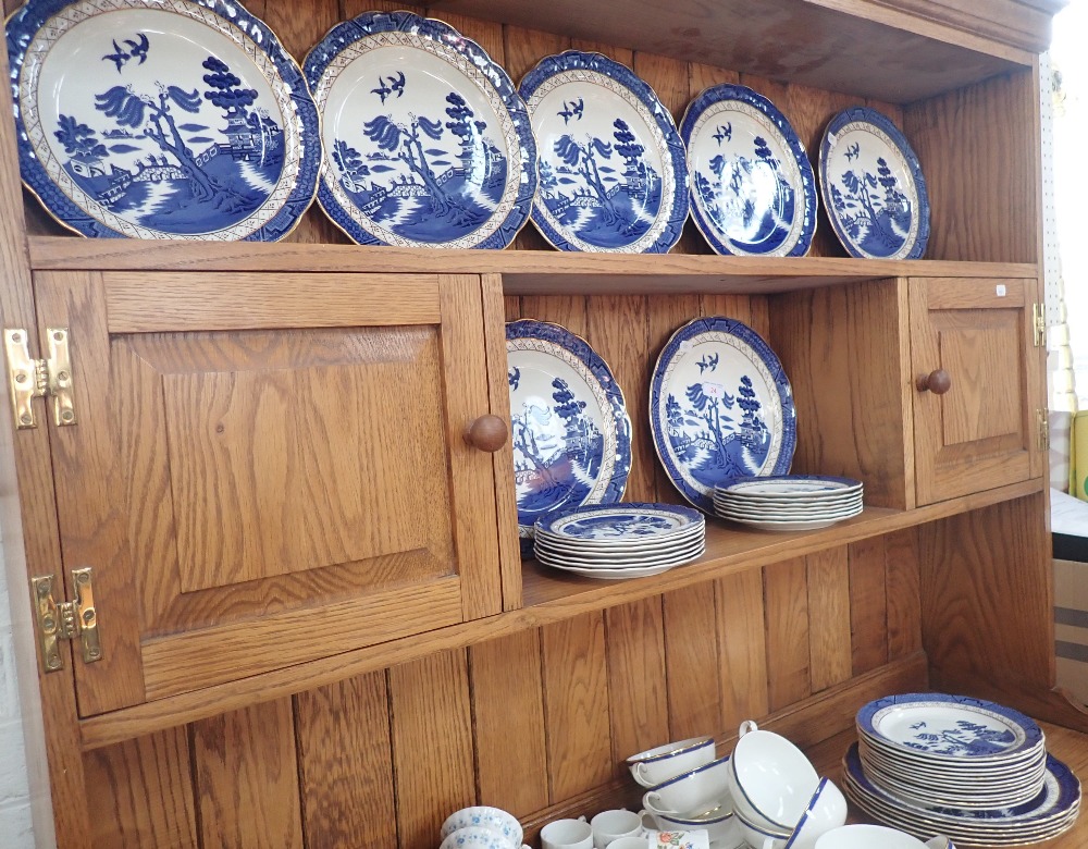 A COLLECTION OF ROYAL DOULTON 'BOOTHS' OLD WILLOW DINNER PLATES and side plates