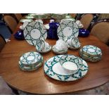 A COLLECTION OF FOLEY CHINA TEA WARE with stylized flowers within a green border