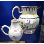 AN 18TH CENTURY 'SPARROW BEAK' JUG, 10.5cm high and a 19th century jug with hunting scenes (2)