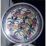 A POOLE POTTERY STUDIO CHARGER, decorated in the BM pattern by Karen Brown, 35.5cm dia
