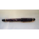 A WATERMAN FOUNTAIN PEN with purple marbled body