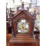 A VICTORIAN WALNUT CASED MANTEL CLOCK, by 'Camerer, Kuss & Co'