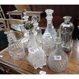 A COLLECTION OF CUT GLASS DECANTERS (examine)
