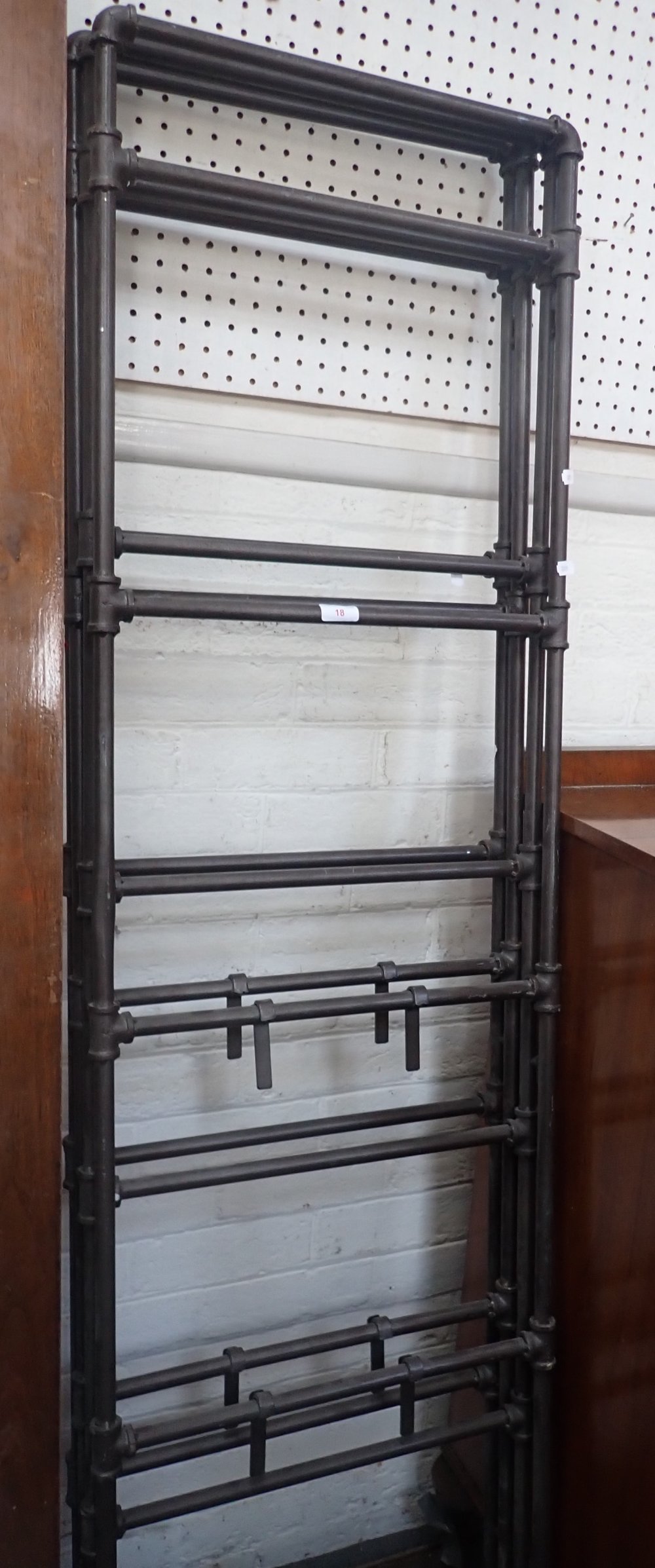 A PAIR OF TWO-FOLD DISPLAY STANDS made from metal pipes, in the industrial style, 180cm high x