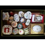 A COLLECTION OF ENAMEL PILL BOXES, two clocks and sundries