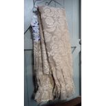 A LARGE PAIR OF LINED CURTAINS with figured cream embossed velvet