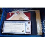 A COLLECTION OF COMMEMORATIVE COINS AND STAMP PRESENTATION PACKS and other stamps
