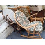 AN ERCOL PALE BEECH AND ELM ROCKING CHAIR and two dark stained arm chairs