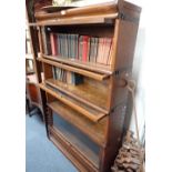 A FOUR SECTION OAK GLOBE WERNICKE BOOKCASE 86cms wide