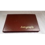 AN AUTOGRAPH ALBUM including Lester Piggott, Liam Bradey, Billy Walker, Terry Wogan and Hurricane Hi