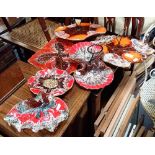 A COLLECTION OF VINTAGE CONTINENTAL BRIGHTLY GLAZED CERAMIC SERVING DISHES, to include cheese boards